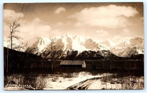 RPPC SEWARD, AK Alaska ~ CANNERY? on WATER & Mountains c1910s  Postcard