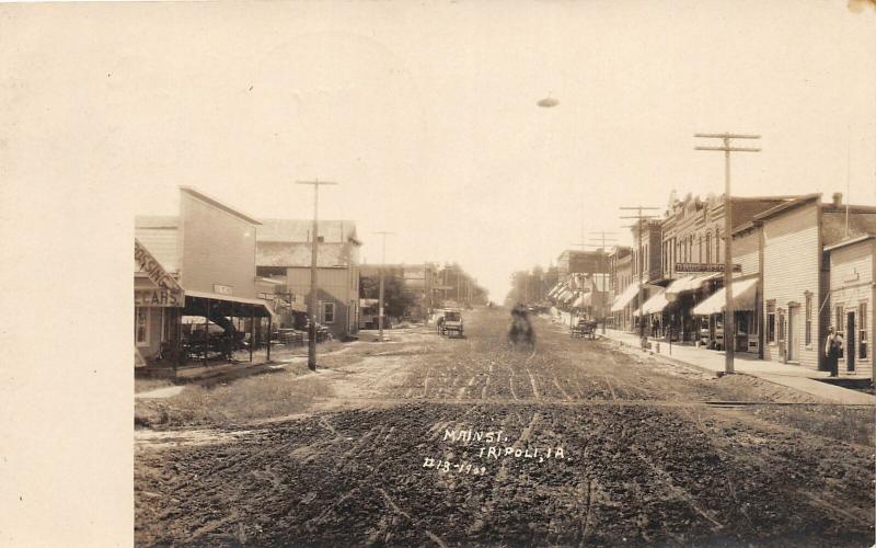 F35/ Tripoli Iowa RPPC Postcard 1911 Main Street Stores Dirt