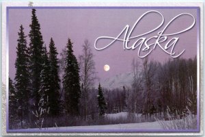 Moon rise in the Alaska winter. Ice fog and snow collect on the trees, Alaska