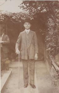 Social history real photo postcard elegant young man with hat & walking stick