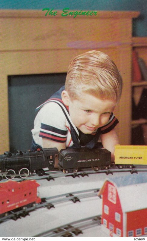 Boy with a toy train , 1950-60s