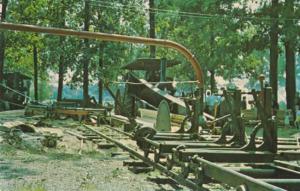 Old Steam Engine being used to power a Saw Mill