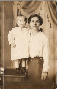 RPPC Skinny Mother and Boy on Table Cute Shoes Postcard U9