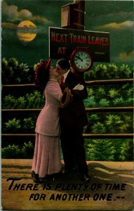 1912 Theochrom Postcard Romance Plenty Of Time Kissing on Train Platform