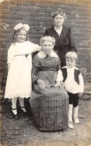 Two women and two children Adults & Children Unused 