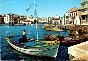 CONTINENTAL SIZE POSTCARD VIEW OF THE TOWN OF AGIOS NIKOLAOS CRETE MAILED 1980