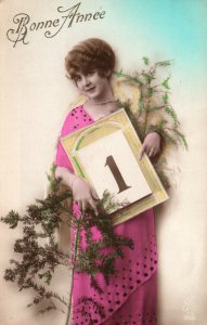 VINTAGE POSTCARD WOMAN STUDIO MODEL DISPLAYING 1 FOR JAN 1st NEW YEAR c. 1910