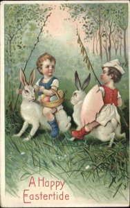 Easter Children Fantasy Riding Giant Bunny Rabbits Embossed c1910s Postcard