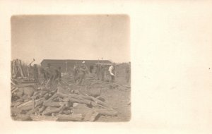 Vintage Postcard 1910's Photo of Men Cutting Branches of Trees Wood Stock