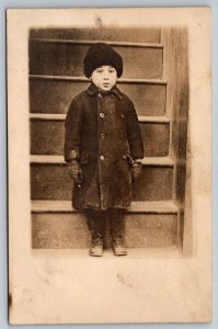 RPPC Young Boy In Front of Stairway  Real Photo  c1910