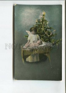 473083 XMAS Christmas ANGEL & Baby Jesus near Tree Vintage postcard