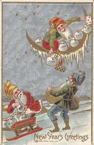 Elves tossing money from moon silver gilt New Year Postcard c1911