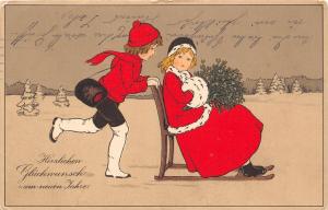 BG20074 girl on sledge and boy mistletoe new year neujahr  germany