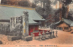 STONE LION AT TOSHOGU NIKKO JAPAN POSTCARD (c. 1908)