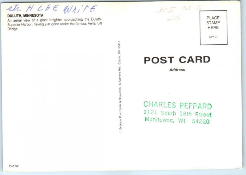 An aerial view of a giant freighter approaching the DuluthSuperior