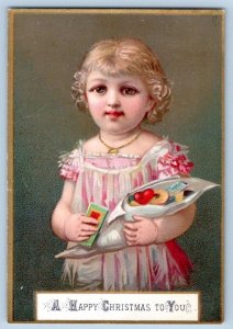 1880-90's A HAPPY CHRISTMAS TO YOU GIRL CORNICOPIA OF GIFTS VICTORIAN CARD
