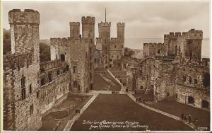 Caernarvon castle old sepia postcard, unused Interior from Q. Eleanor's gateway