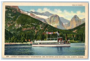 c1930s Launch International on Waterton Lake Nat. Park Alberta Canada Postcard