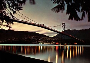 CONTINENTAL SIZE POSTCARD LIONS GATE BRIDGE AT DUSK VANCOUVER BRITISH COLUMBIA