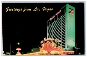 c1950's Flamingo Hilton at Night Greetings from Las Vegas NV Vintage Postcard