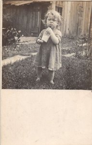 J38/ Interesting RPPC Postcard c1910 Baby Drinking Milk Bottle 240