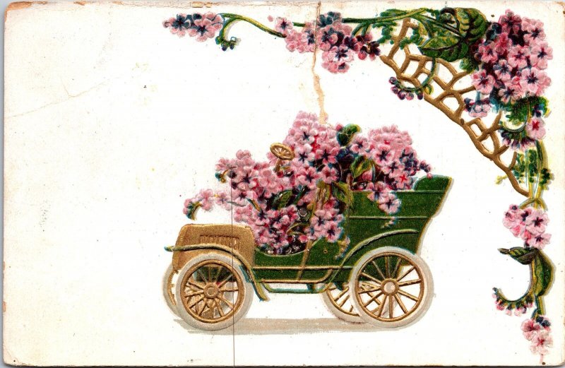 VINTAGE POSTCARD BUGGIE CAR FILLED WITH FLOWERS PRINTED IN GERMANY [repaired]