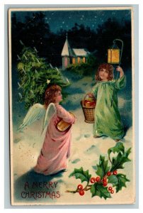 Vintage 1907 Christmas Postcard Angel Meets Cute Girl in the Snow Near Church