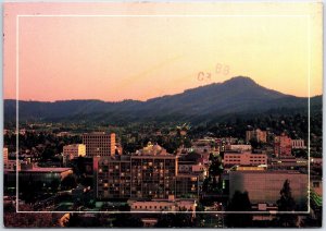 VINTAGE POSTCARD CONTINENTAL SIZE DOWNTOWN EUGENE OREGON AT TWILIGHT 1983