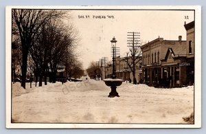 J90/ Juneau Wisconsin RPPC Postcard c1910 Oak Street Fountain Stores  141