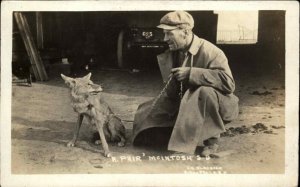 McIntosh South Dakota SD Tame Fox Americana Man in Hat Holding Chain c1910 RPPC