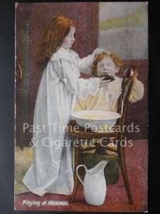 Old PC - 'Playing at Mammas' showing Girl Washing Boys Face  - J.W.B. Series 301