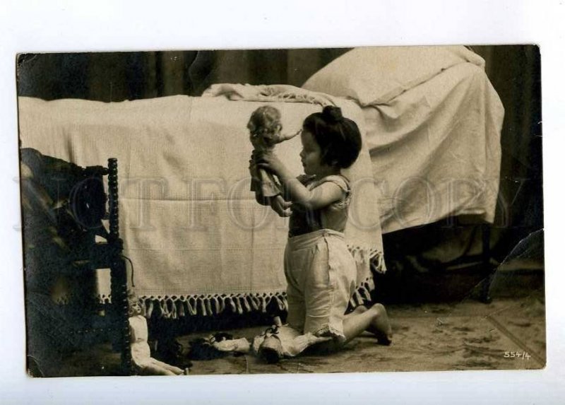 234049 Little GIRL playing w/ DOLL Bed Vintage PHOTO Stender