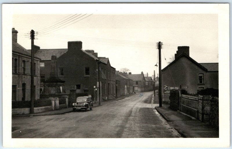 c1940s Doagh, Antrim, Ireland Real Photo Main St Downtown Car Village Lyon A173