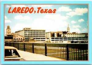 VINTAGE CONTINENTAL SIZE POSTCARD 1970s VIEW OF LAREDO TEXAS FROM INT'L BRIDGE