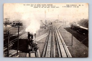 DAIREN STATION COMPOUND TRAIN DEPOT CHINA POSTCARD (c.1910)