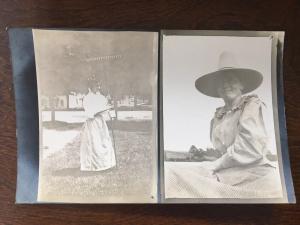 Woman with a hay rake and on in sunhat On Farm B11