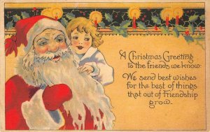 Christmas Greetings SANTA CLAUS Candles Holly Leaves c1910s Vintage Postcard