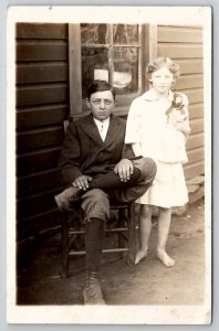 RPPC Brother with Barefoot Sister with Antique Doll c1915 Portrait Postcard E29