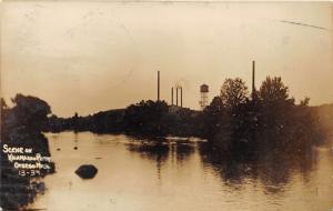 Otsego Michigan~Kalamazoo River Scene~Water Tower-Smoke Stacks in Bknd~1910 RPPC