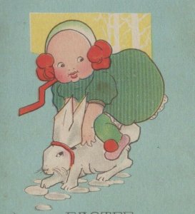 c1910s Easter Greetings child toddler in green riding white rabbit snow C619 