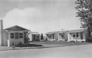 BEACH MOTEL CABINS WOODLAND BEACH DELAWARE DEXTER PRESS POSTCARD (1930s)