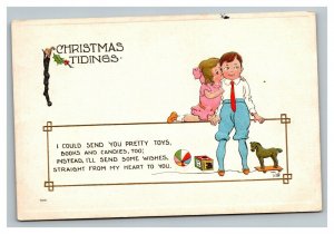 Vintage 1920's Art Deco Christmas Postcard Cute Girl Kisses Boy Toys Poem