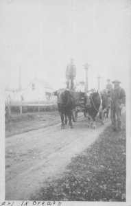 J80/ Interesting RPPC Postcard c1910 Oregon Ox-Drawn Cart Farmer 423
