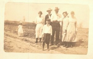 Vintage 1910's RPPC Postcard - Snapshot of Family on the Side of a Country Road