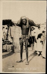 Lagos Nigeria Native Black Man Peddling Drinking Water Real Photo Postcard