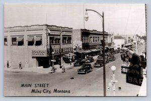 J90/ Miles City Montana RPPC Postcard c1950s Main Street Stores  663