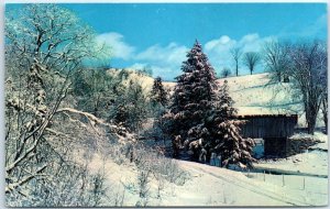 Winter spreads its charm over this Old Covered Bridge at Jeffersonville, Vermont