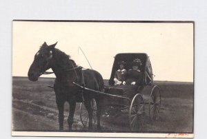 RPPC REAL PHOTO POSTCARD HORSE PULLING BUGGY WITH WOMAN AND GIRL GREAT HATS DRES