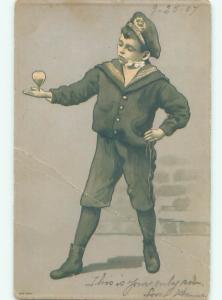 Pre-Linen BOY PLAYS WITH SPINNING TOP AC1812