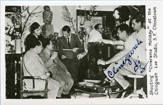 Autographed Chingwah Lee shooting Cinerama Holiday  *RPPC